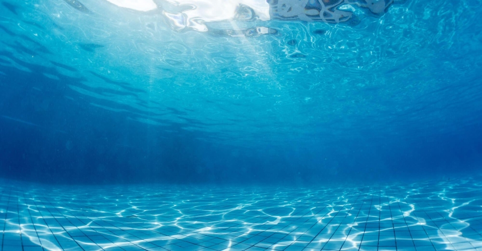 underwater in an in-ground pool