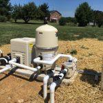 water pump behind house